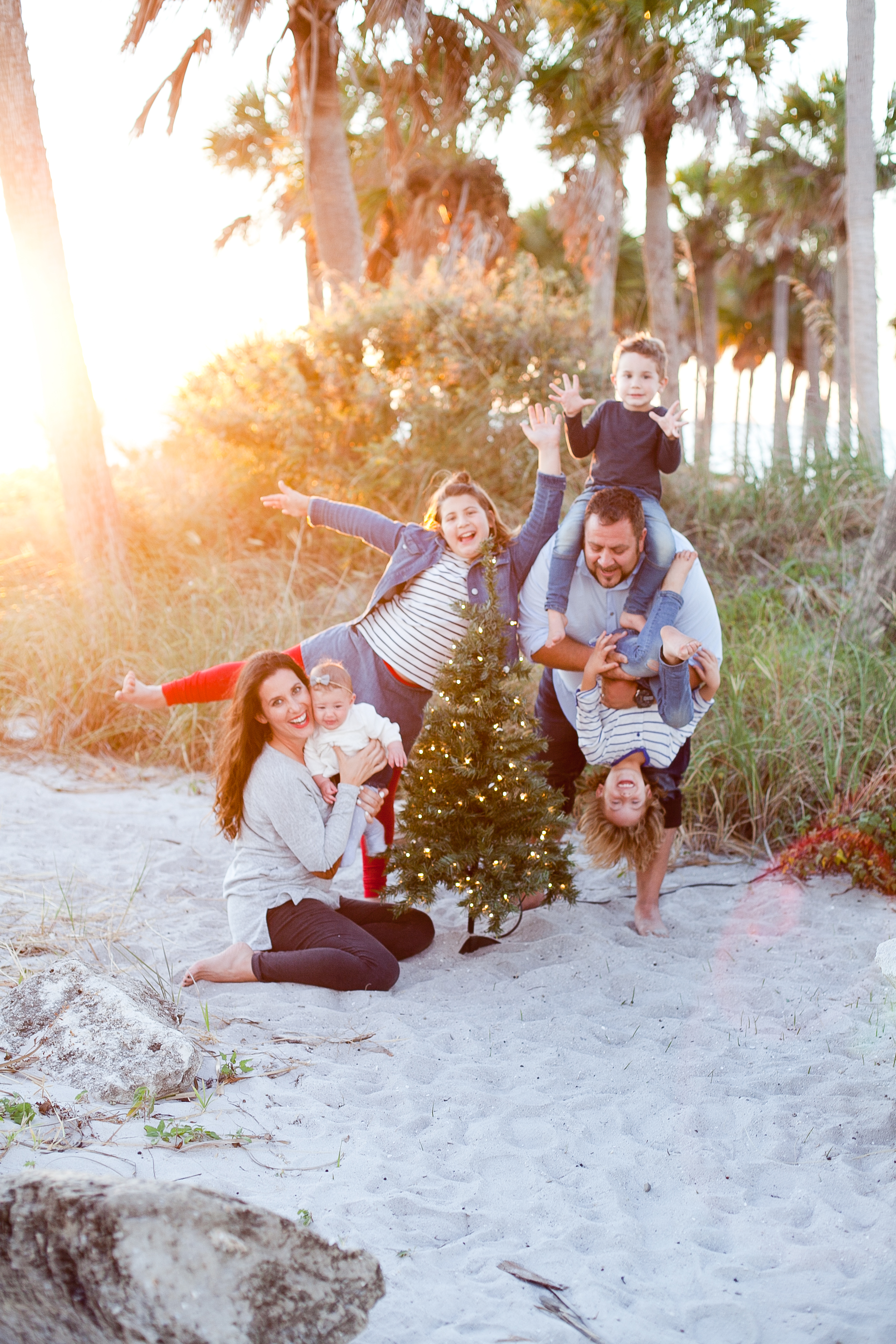 A frolicking, fun, family Christmas card photo shoot at the beach!