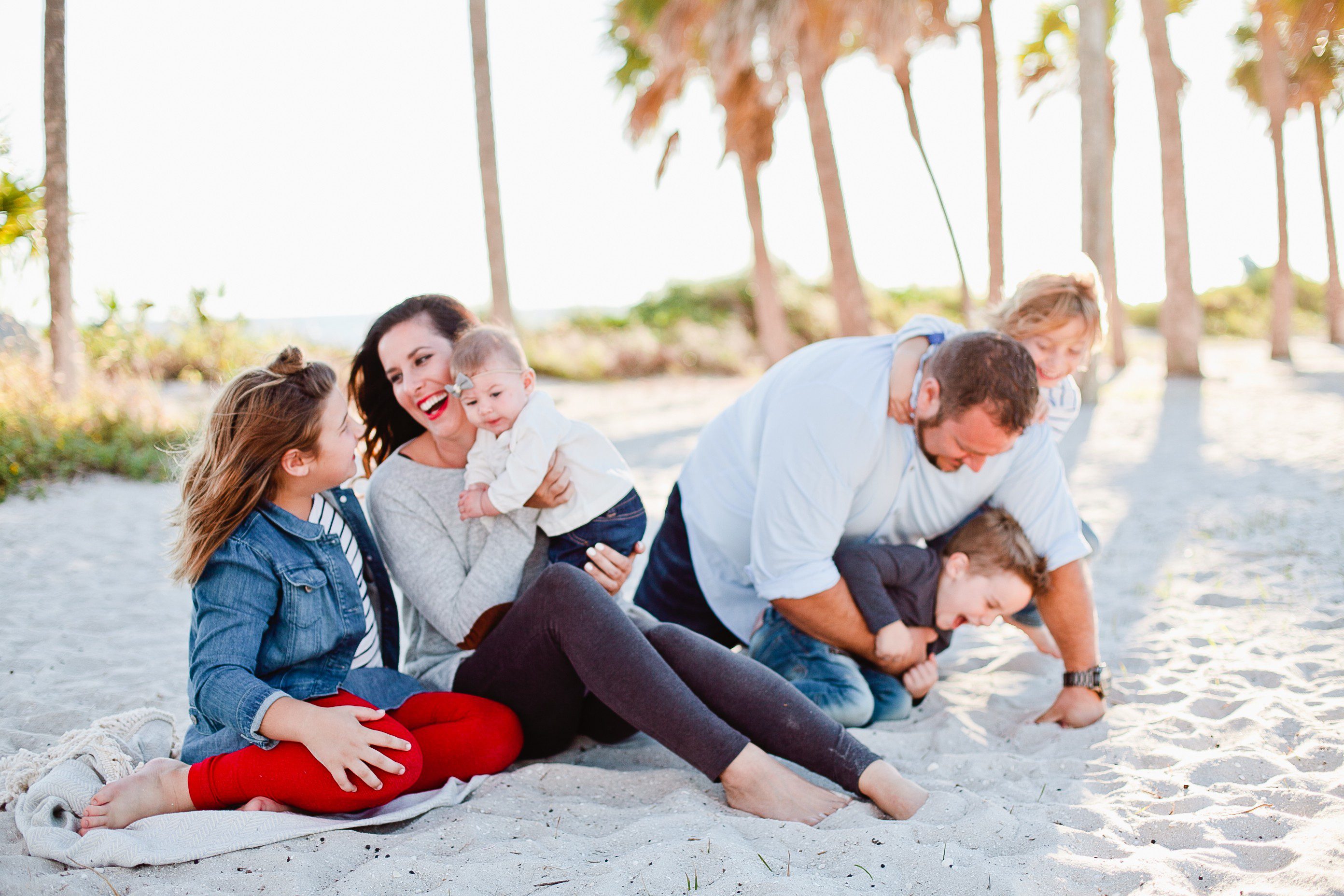 A frolicking, fun, family Christmas card photo shoot at the beach!