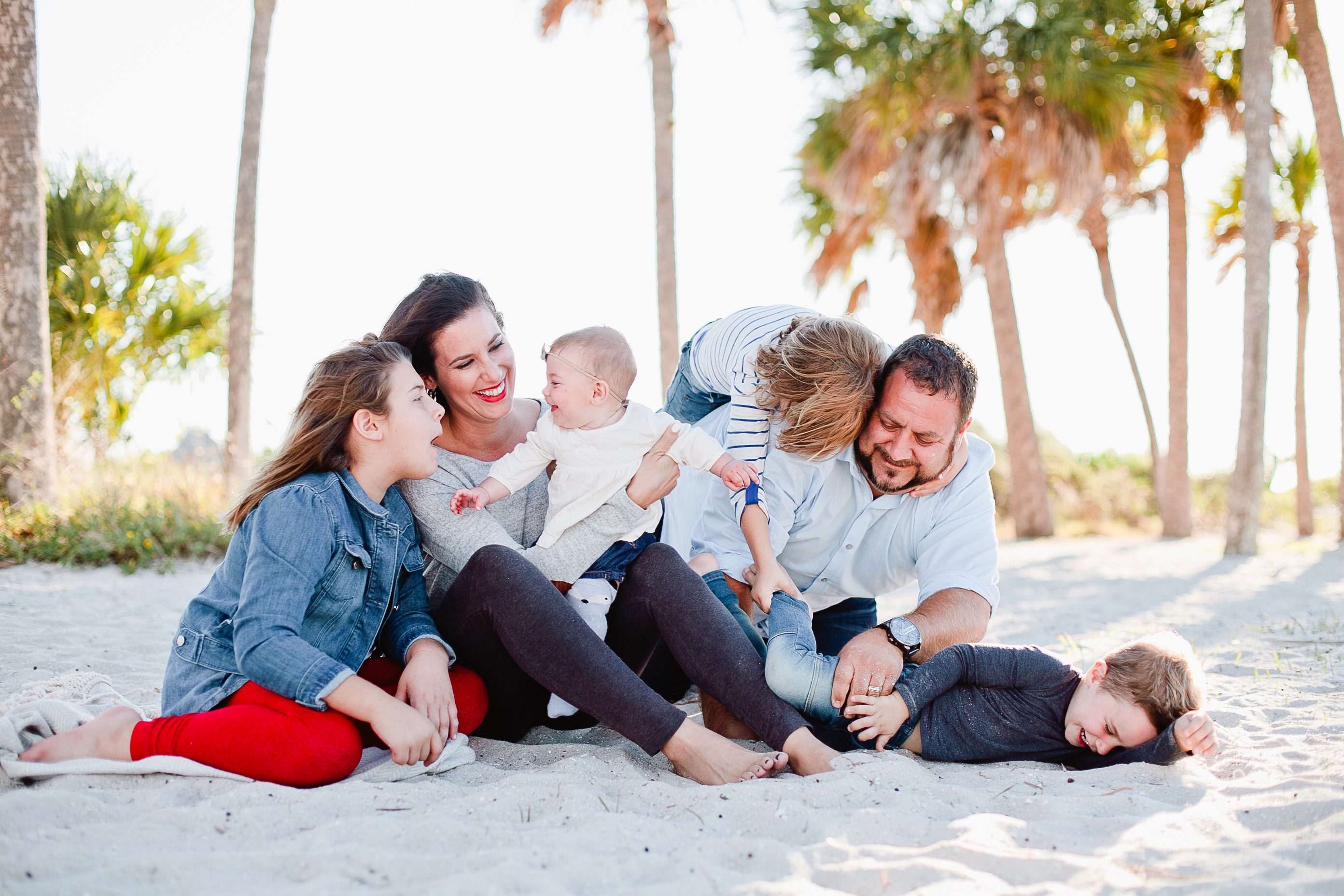 A frolicking, fun, family Christmas card photo shoot at the beach!