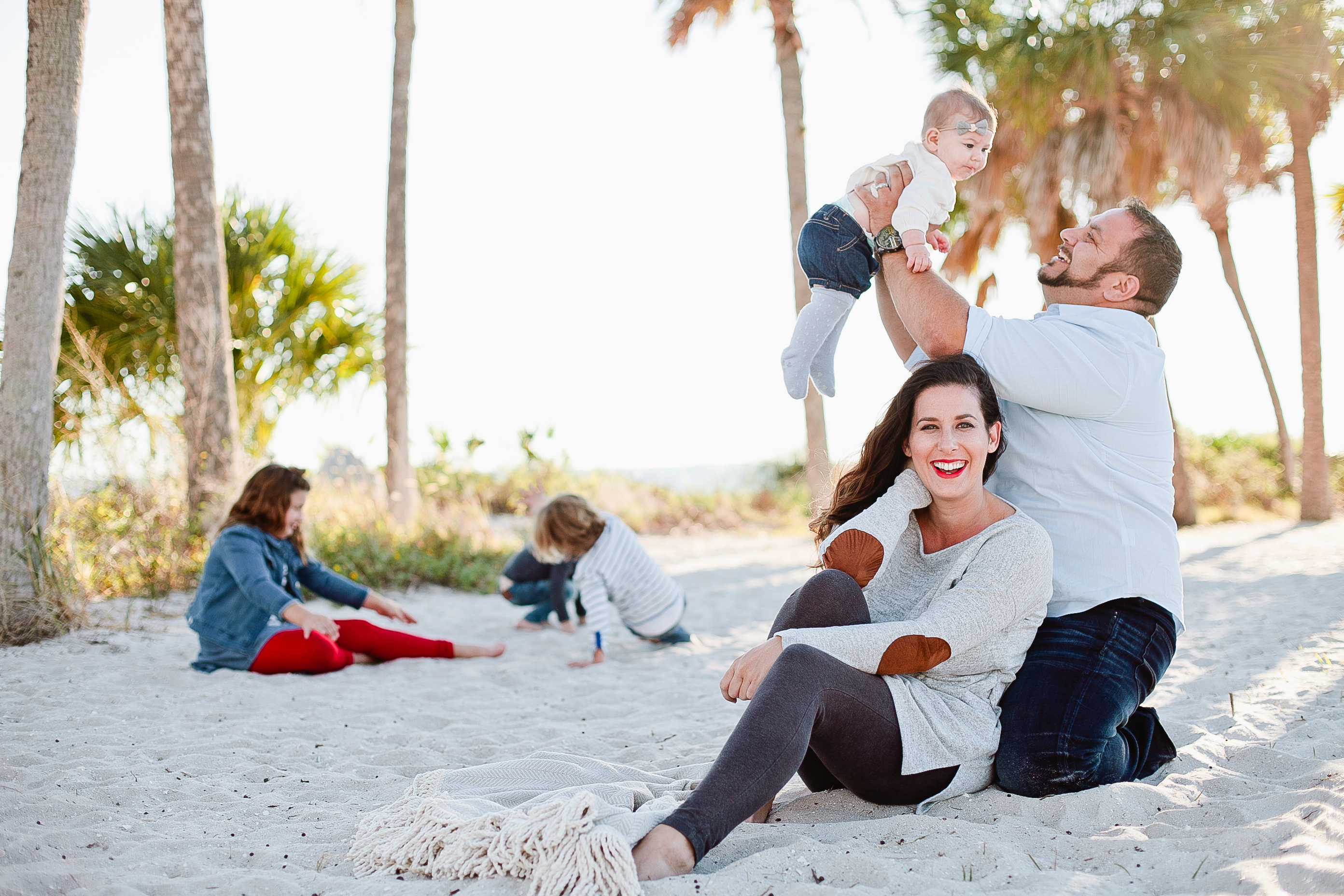 A frolicking, fun, family Christmas card photo shoot at the beach!