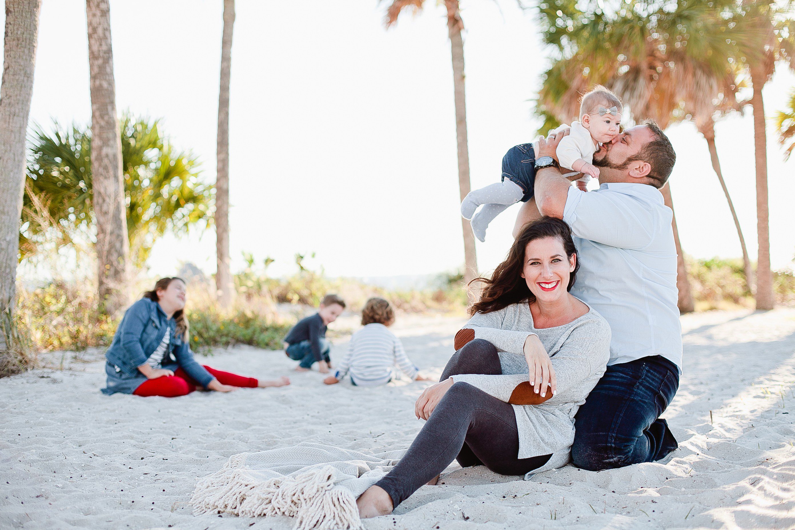 A frolicking, fun, family Christmas card photo shoot at the beach!