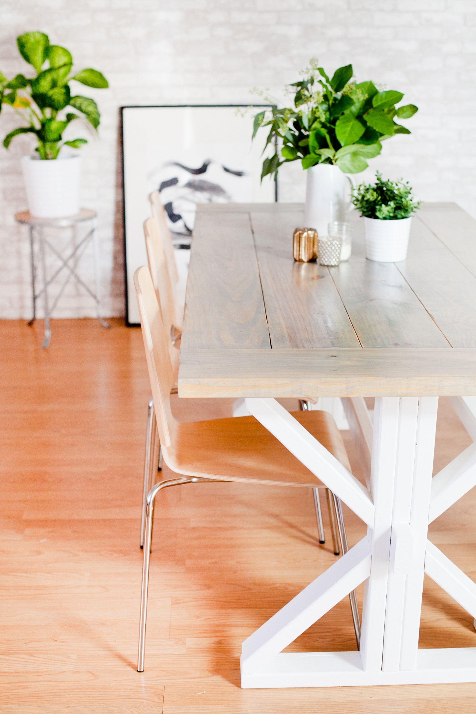 A DIY Farmhouse Table for Kitchen or Dining for under $100. See the full farmhouse table tutorial!