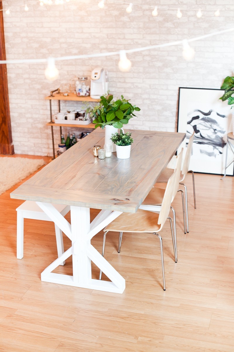 A DIY Farmhouse Table for Kitchen or Dining for under $100. See the full farmhouse table tutorial!