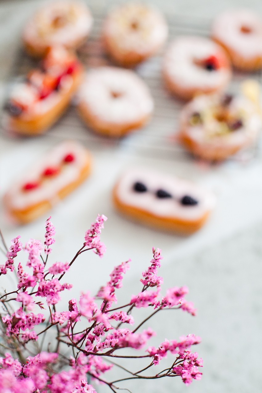There's definitely no right or wrong way to celebrate with donuts, whether it be a special occasion or a normal day you want to delight in. Invite some friends over or bring out your toppings and let the family have at it to sweeten the deal! Let everyone frost their own DIY pretty in pink donuts and compare toppings before indulging that sweet tooth with every bite!