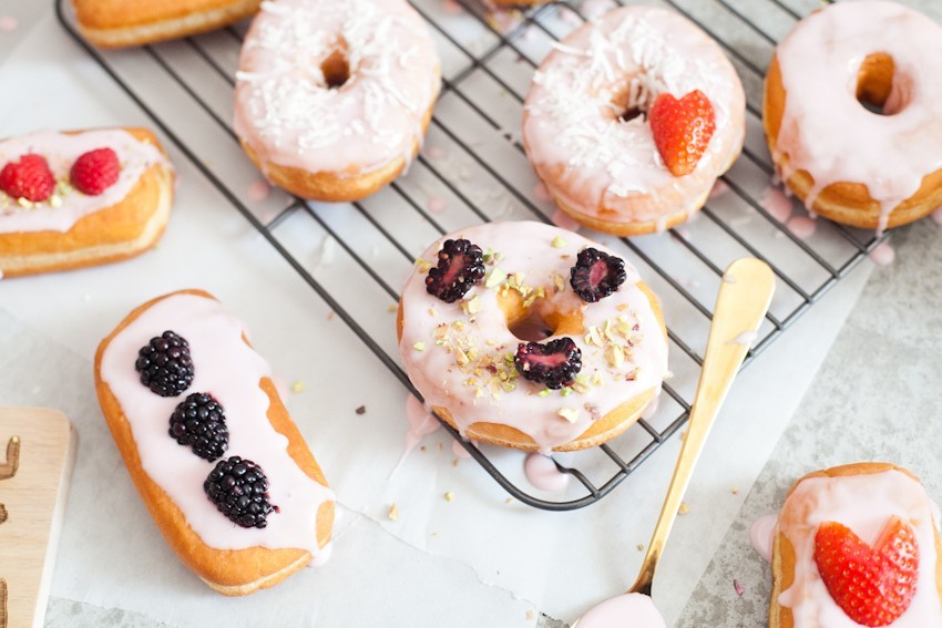 There's definitely no right or wrong way to celebrate with donuts, whether it be a special occasion or a normal day you want to delight in. Invite some friends over or bring out your toppings and let the family have at it to sweeten the deal! Let everyone frost their own DIY pretty in pink donuts and compare toppings before indulging that sweet tooth with every bite!