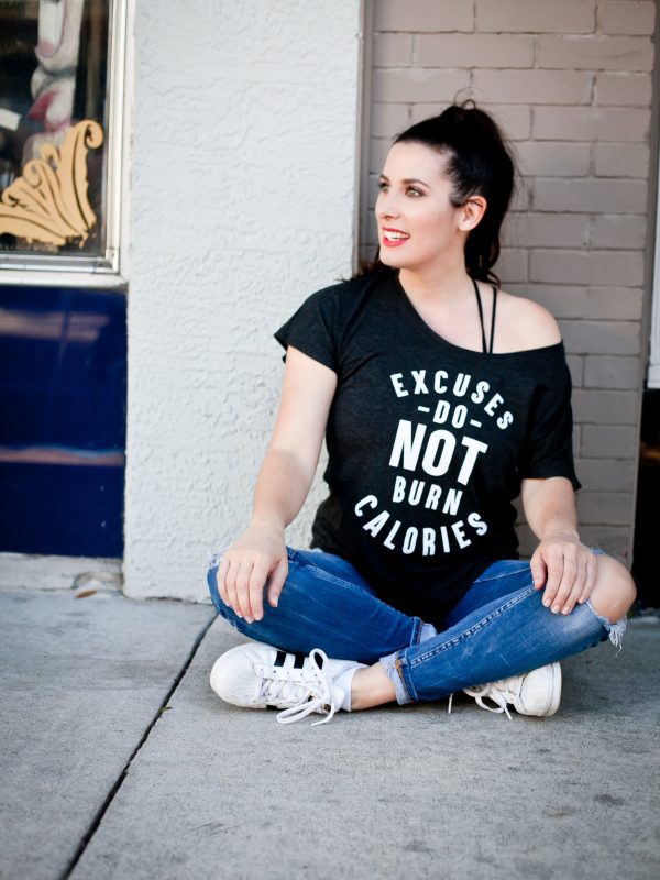 Who needs a little encouragement to burn those calories?! *Hand Raised* We all know it, and now we can SHARE it too. Excuses do NOT burn calories, but walking around in style in this new statement tee does!