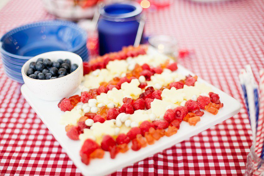 A patriotic flag snack tray that will impress your guests and get you in an Americana mood while you feel good about what you're serving with these healthier options!