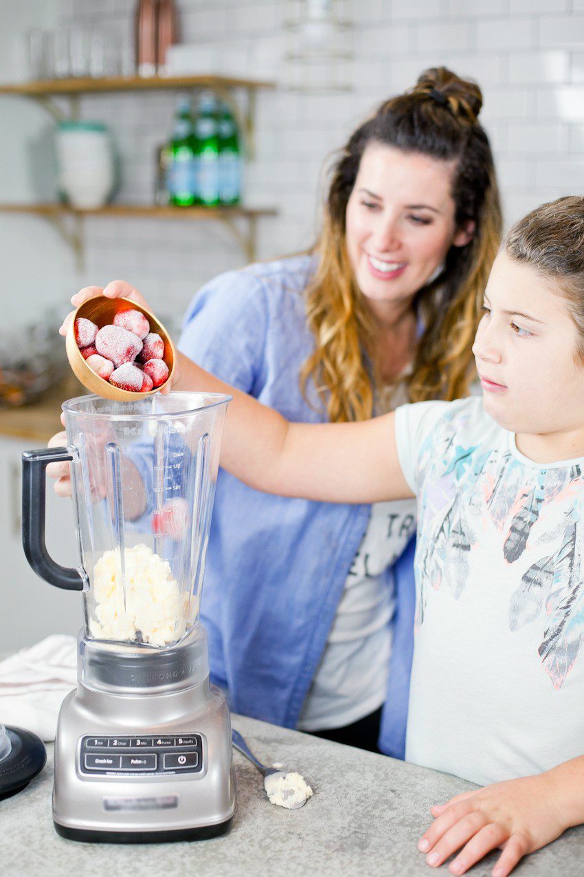 These Epic Royal Crazy milkshakes are indulgently MAGICAL! A rich, thick strawberry milkshake is topped with a sugaring of sprinkles and candies to make a delicious drink fit for a princess... or a prince. A pretty in pink and purple freak shake!