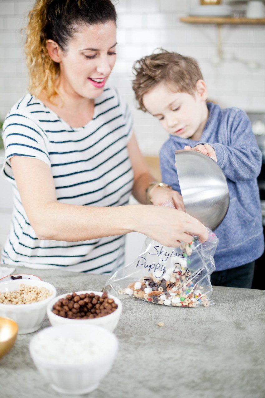 Kid Friendly Trail Mix Puppy Chow Activity and Snack! The kids will love this fun way to build and create their own trail mix, even on a rainy day!