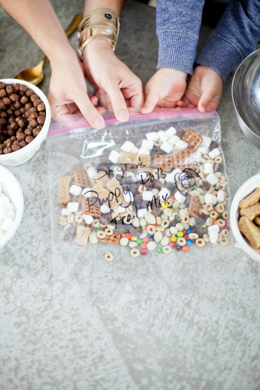 Kid Friendly Trail Mix Puppy Chow Activity and Snack! The kids will love this fun way to build and create their own trail mix, even on a rainy day!