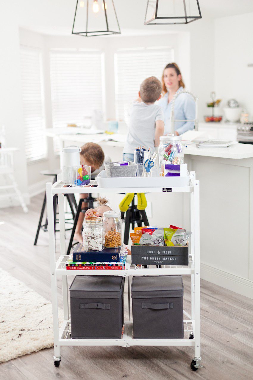 Prep for a clutter free school season with this portable DIY homework station! Makes a perfect craft station too, and rolls out of the way when finished. | How to Get Ready for School: 5 Sensational Strategies to Make Easy on your Family by popular Tampa life and style blog, Fresh Mommy: image of homework cart.