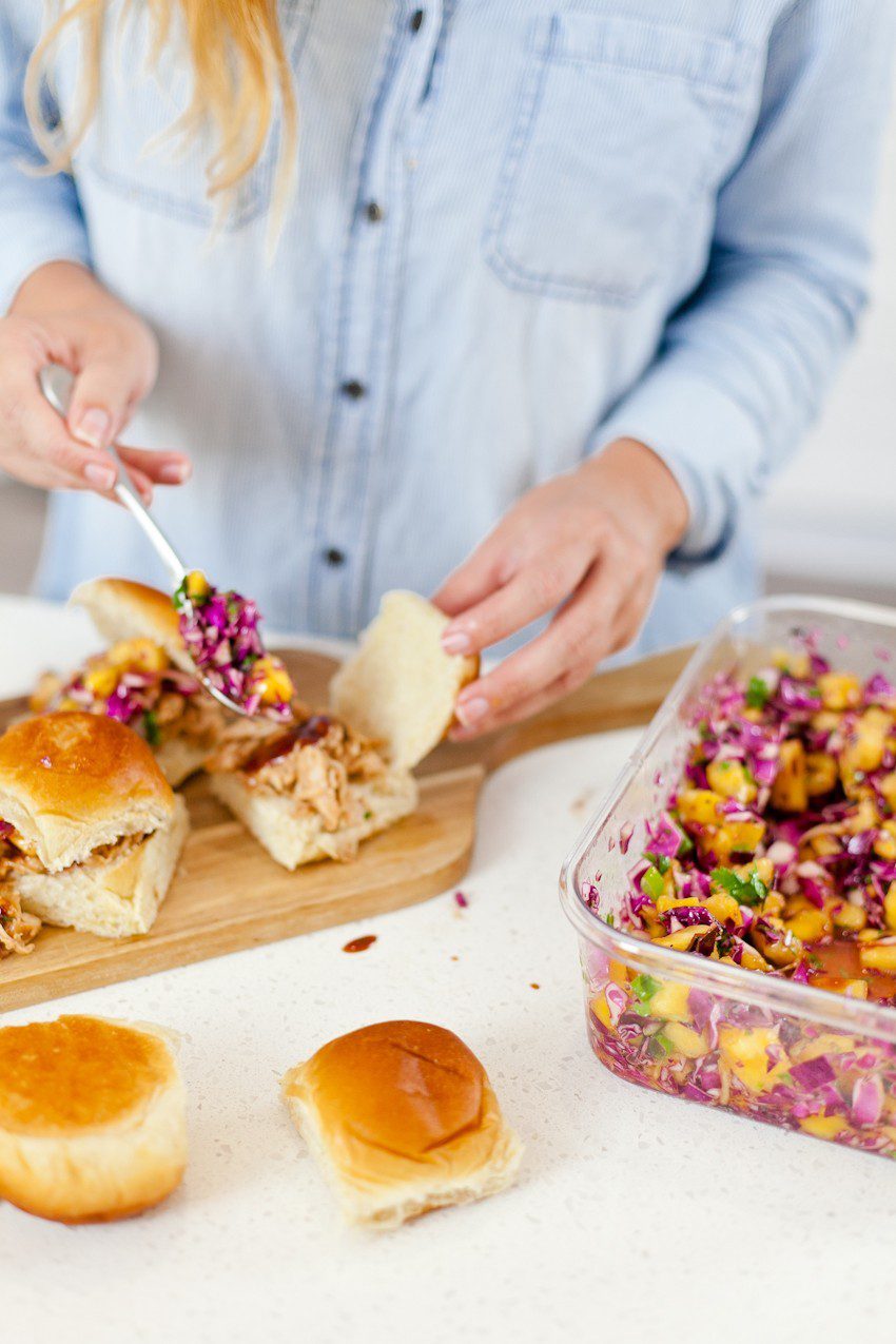 Easy Entertaining and BBQ Hawaiian Chicken Sliders recipe with pineapple mango slaw. Great summer backyard barbecue ideas featured by popular Florida foodie blogger Fresh Mommy Blog