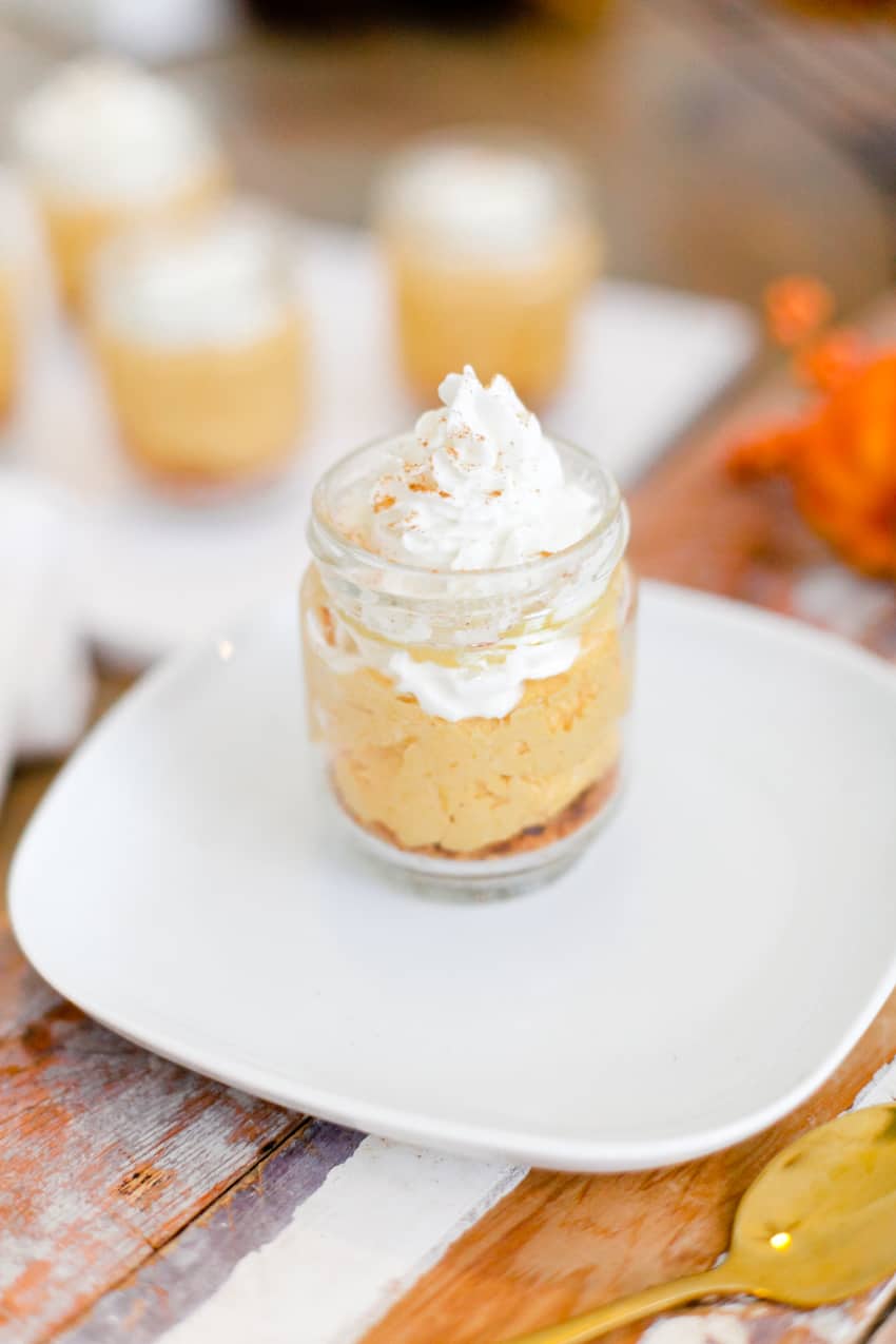 The best No Bake Pumpkin Cheesecake combines some of the favorite flavors of fall! Serve this pumpkin dessert jar for an easy individual serving! Perfect for desserts, parties, fall events and more.