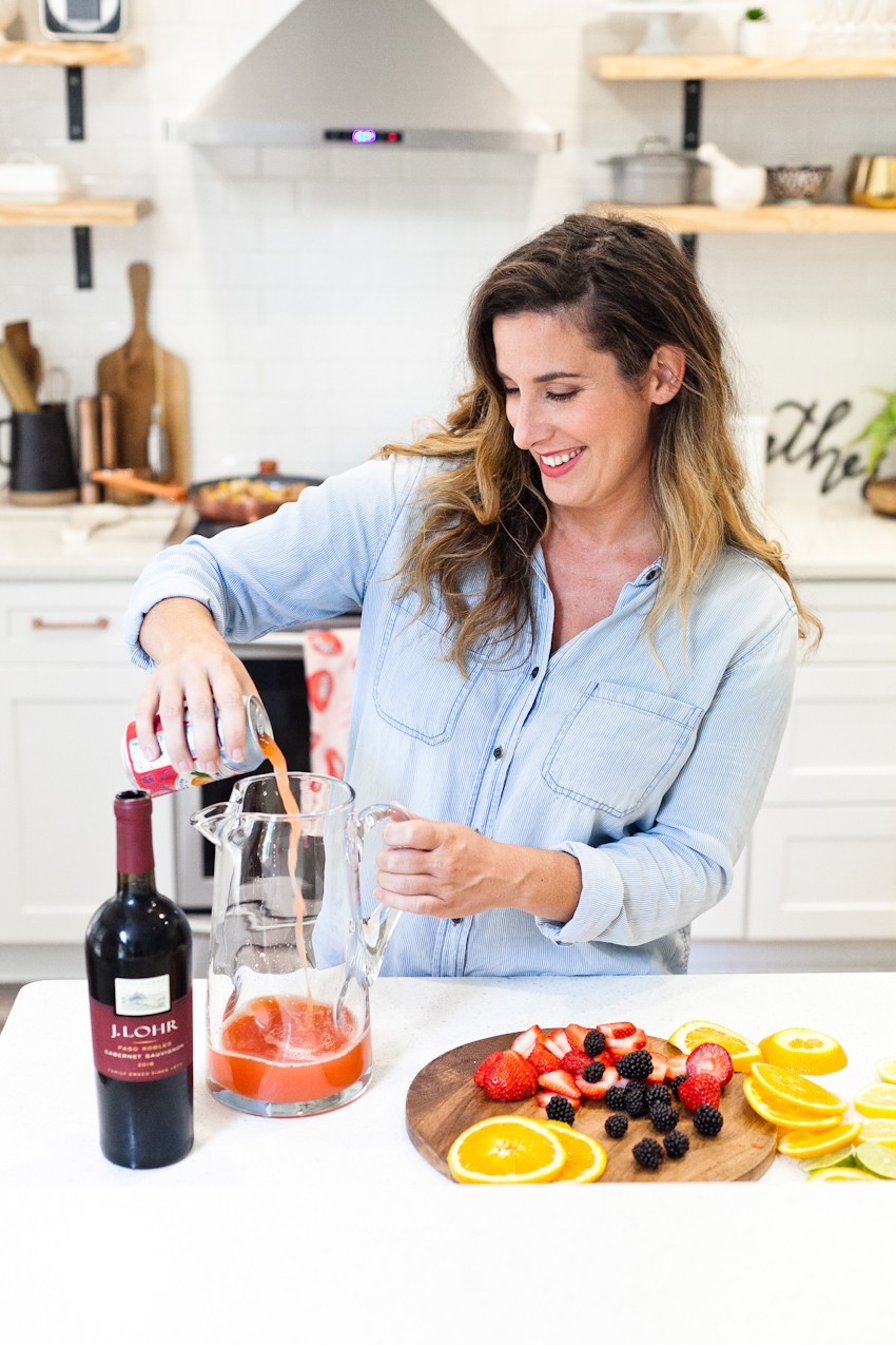 What better way to celebrate the season than with a blood orange berry summer sangria? It's our go-to summer drink and with one big hack to make sangria even easier, this recipe is perfect for your next gathering or summer get together! - Refreshing Blood Orange Berry Summer Sangria Recipe featured by popular Florida lifestyle blogger, Tabitha Blue of Fresh Mommy Blog