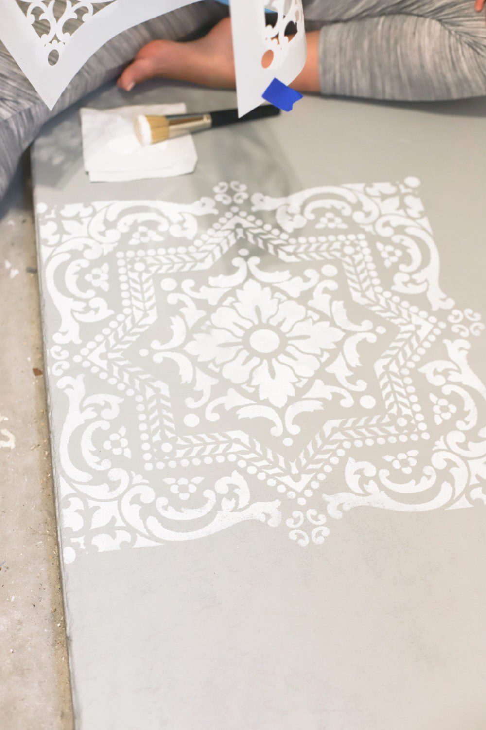 Laundry Room DIY: How to Paint a Cement Floor with Stencils | Laundry Room DIY: How to Paint a Cement Floor with Stencils by popular home decor blog, Fresh Mommy: image of a painted cement floor.