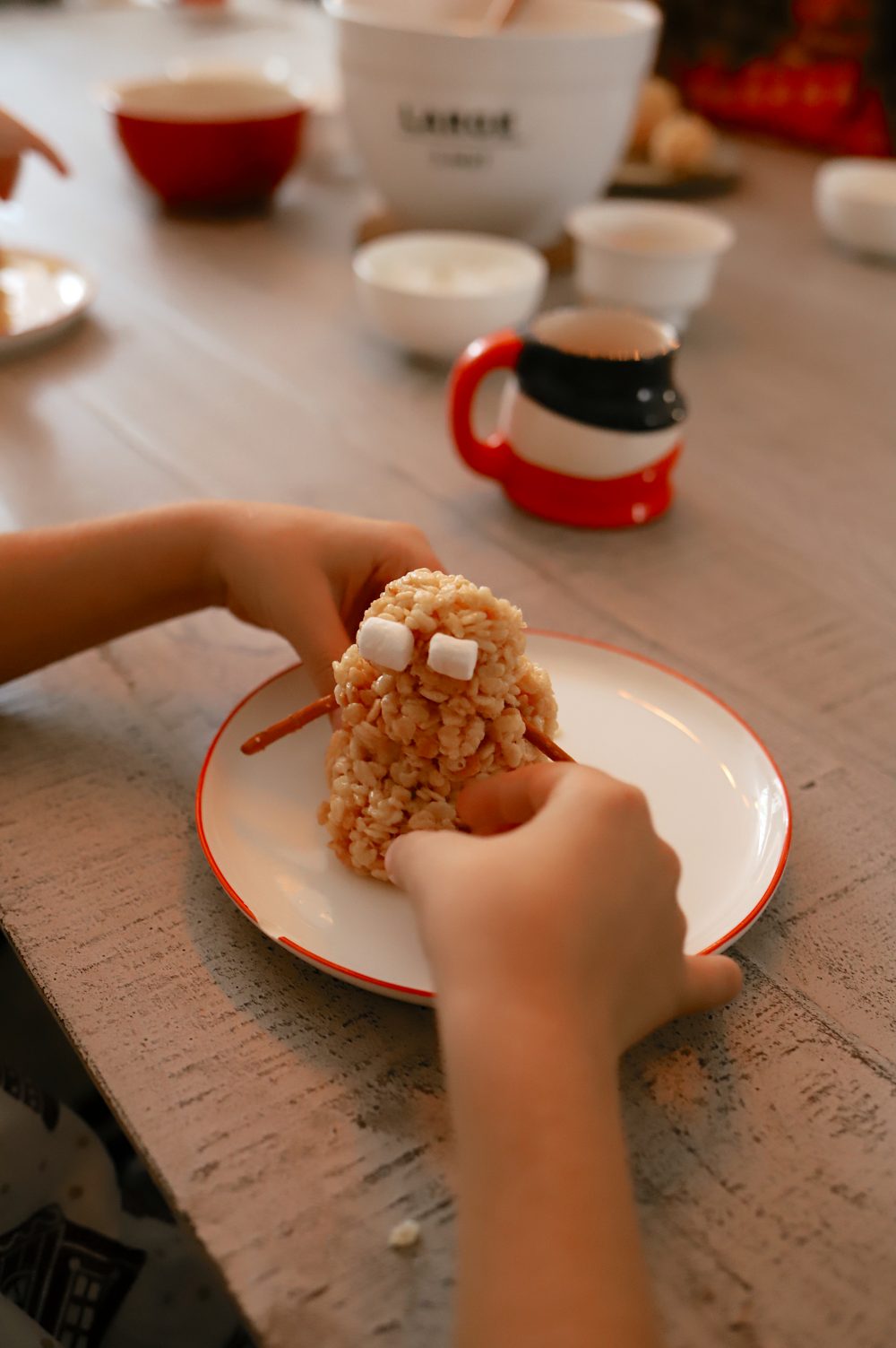 How to Make a Festive Rice Krispies Snowman Christmas Activity from mom and lifestyle blogger Tabitha Blue of Fresh Mommy Blog