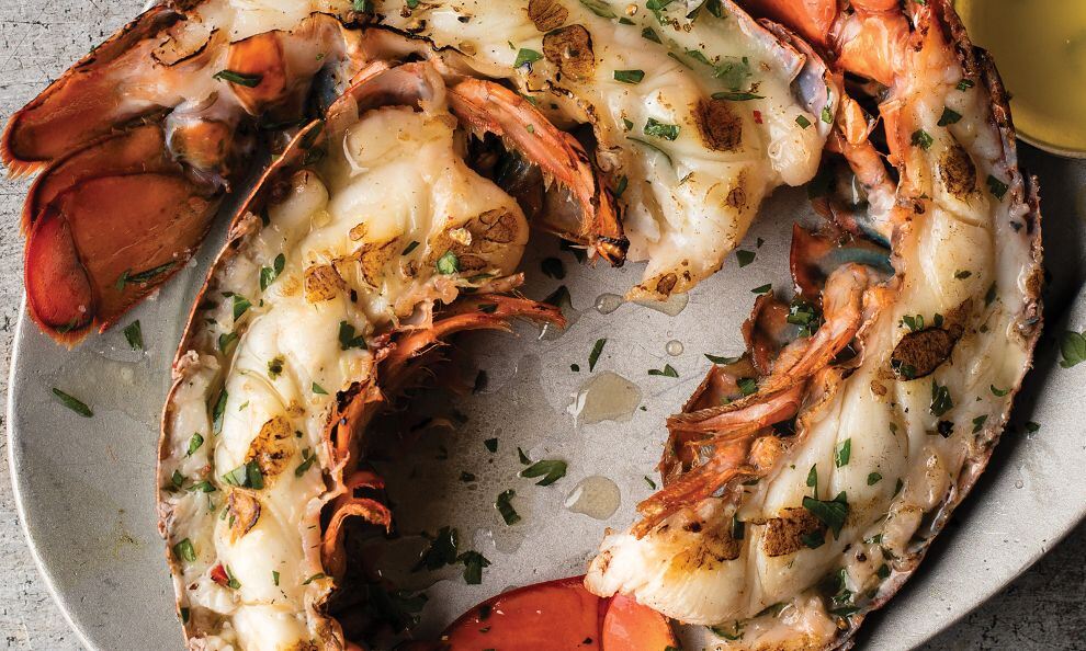 Omaha Steaks Gifts by popular Florida lifestyle blog, Fresh Mommy Blog: image of a plate of lobster tail halves. 
