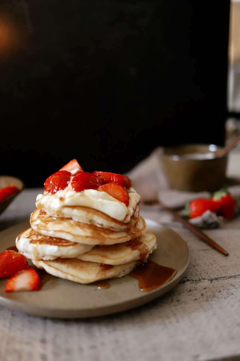 Easy Buttermilk Pancakes with Gingered Strawberries and Cream, a recipe featured by top FL lifestyle blogger, Tabitha Blue of Fresh Mommy Blog.