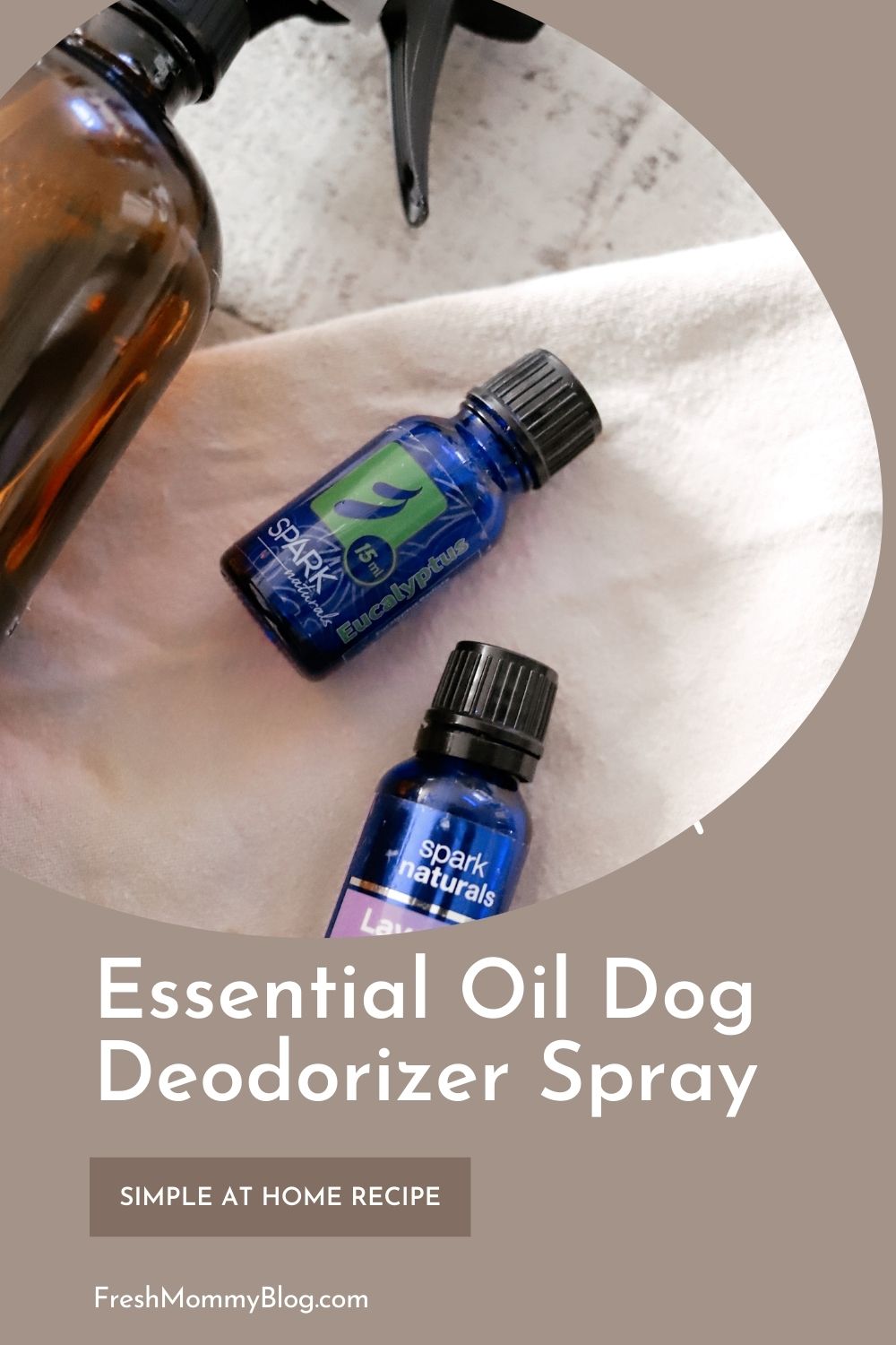 Essential Oils Safe for Dog Deodorizer Spray |Dog Deodorizer Spray by popular Florida lifestyle blog, Fresh Mommy Blog: Pinterest image of a glass amber spray bottle lying next to a bottle of Spark Naturals eucalyptus oil and Spark Naturals Lavender oil. 