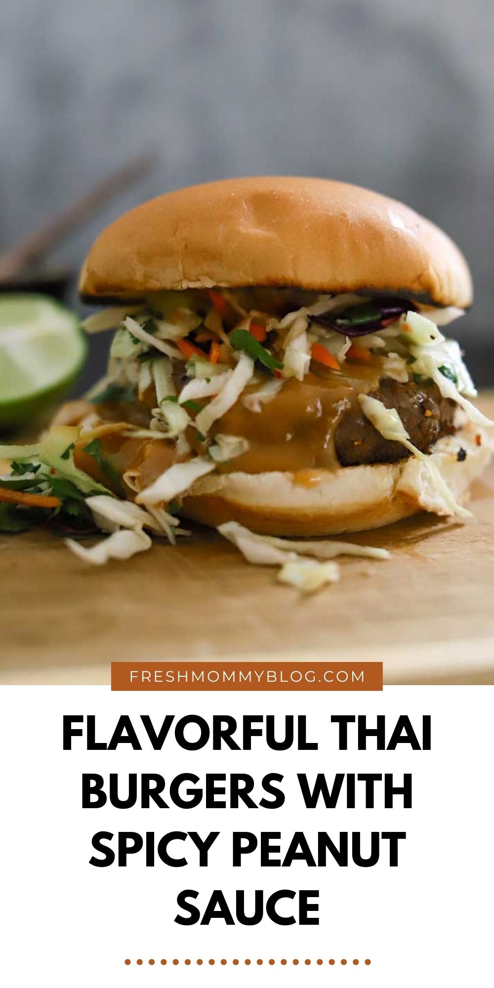 Thai Burgers With Peanut Sauce and 5 Barbeque Side Ideas for delicious family BBQ dinner ideas from top Florida lifestyle and food blogger Tabitha Blue of Fresh Mommy Blog | Thai Burgers by popular Florida lifestyle blog, Fresh Mommy Blog: image of a Thai burger on a wooden serving board. 