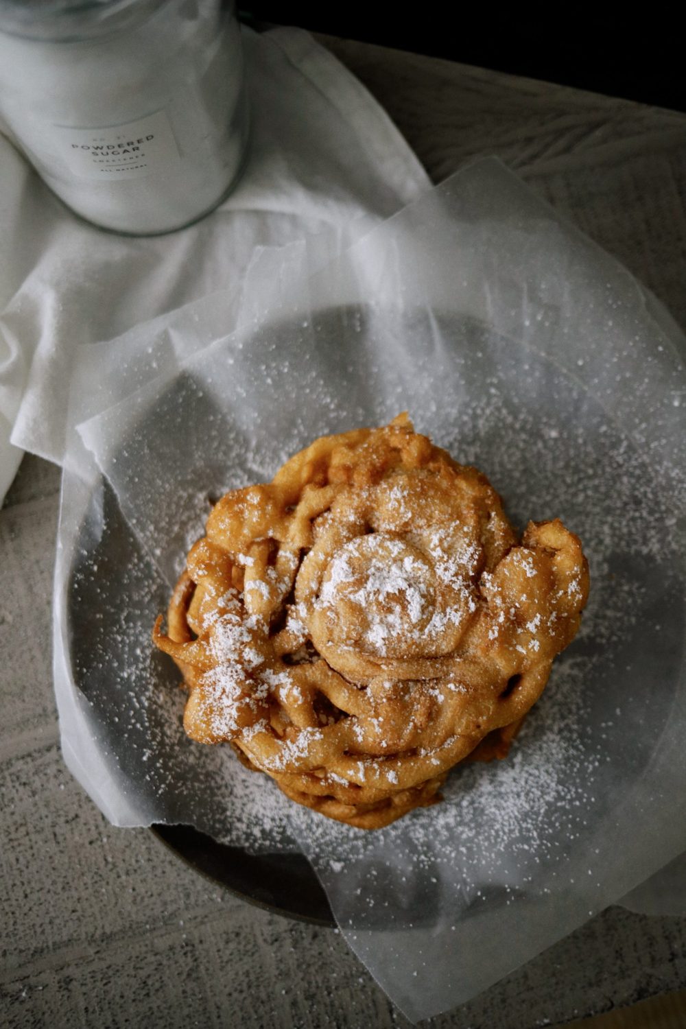 How to Make Yummy Funnel Cake From Pancake Mix at Home | Pancake Mix Funnel Cake, by popular Florida lifestyle blog, Fresh Mommy Blog: image of pancake mix funnel cakes. 
