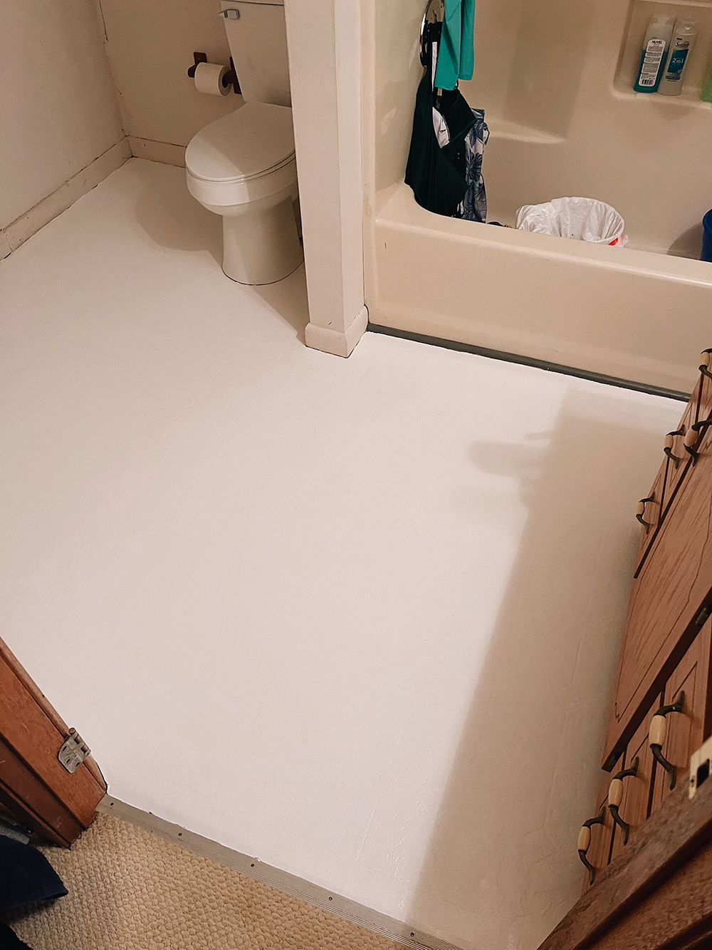 How to Easily Paint Linoleum Floors in your Bathroom a tutorial by home DIY blogger, Tabitha Blue of Fresh Mommy Blog.