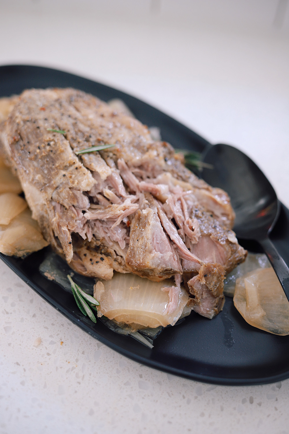 Slow Cooker Pork Roast Recipe - Incredibly Tender with Just Four Ingredients featured by top US blogger, Tabitha Blue of Fresh Mommy Blog