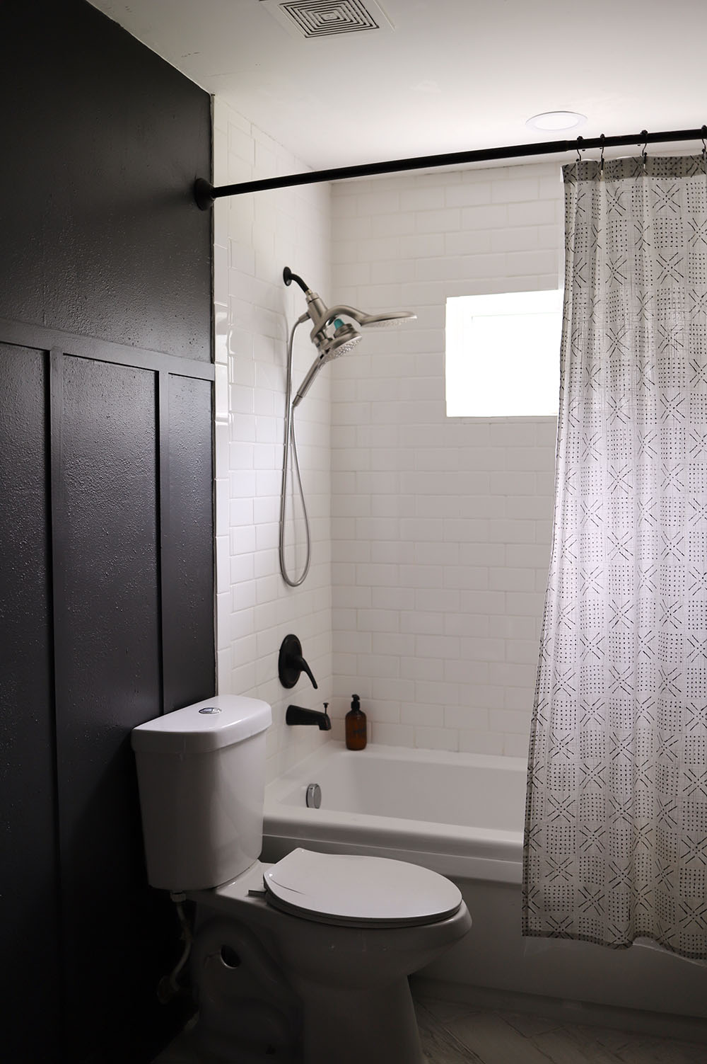Board and Batten Bathroom Makeover- Dark and Moody Transformation for a small bathroom by top Florida lifestyle blogger Tabitha Blue of Fresh Mommy Blog